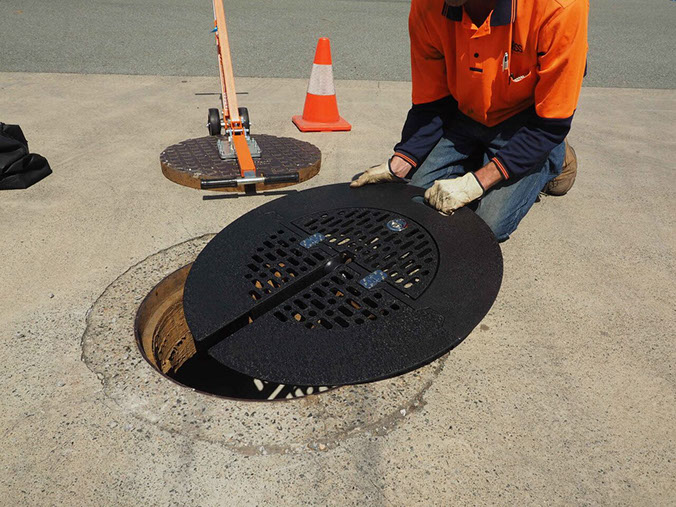 manhole safety grates